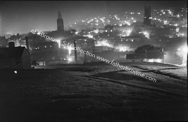 CITY BY NIGHT FROM TOP OF PATRICK'S HILL